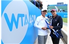 EASTBOURNE, ENGLAND - JUNE 22:  Nadia Petrova of Russia (R) and partner Katarina Srebotnik of Slovenia pose with the trophy after winning the women's doubles final match against Monica Niculescu of Romania and Klara Zakopalova of Czech Republic on day eight of the AEGON International tennis tournament at Devonshire Park on June 22, 2013 in Eastbourne, England.  (Photo by Jan Kruger/Getty Images)